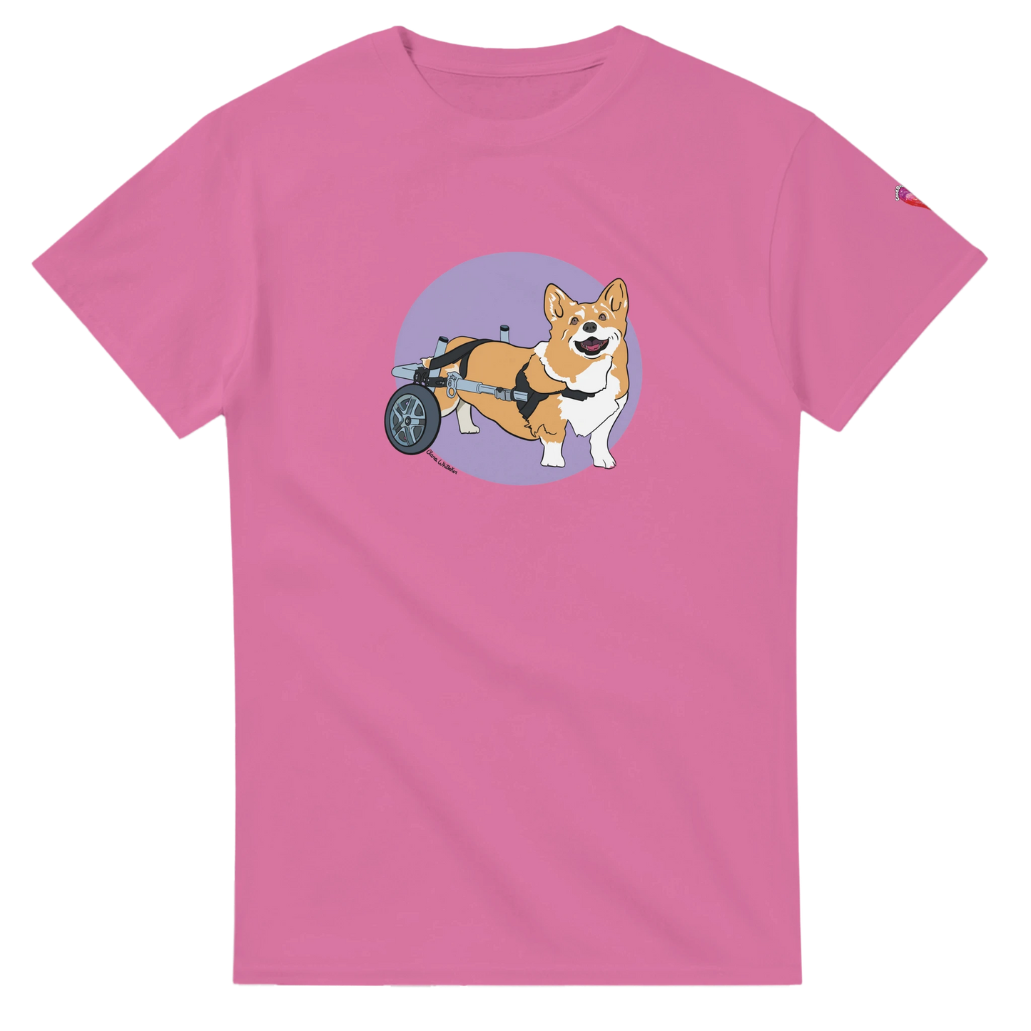 Pink t-shirt with a corgi in a wheelchair graphic on a white background