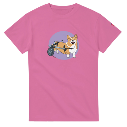 Pink t-shirt with a corgi in a wheelchair graphic on a white background