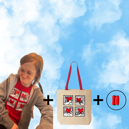 Blue sky with a girl seated where the red love t-shirt next to a tote bag and a fidget toy. 