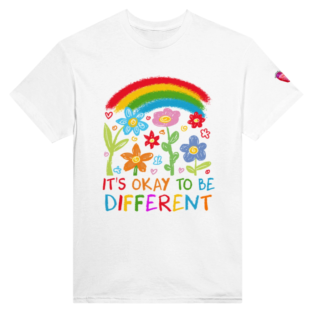 A white short-sleeve crewneck t-shirt featuring a colorful graphic of a rainbow, flowers, and the text 'IT'S OKAY TO BE DIFFERENT' in a playful multicolor font.