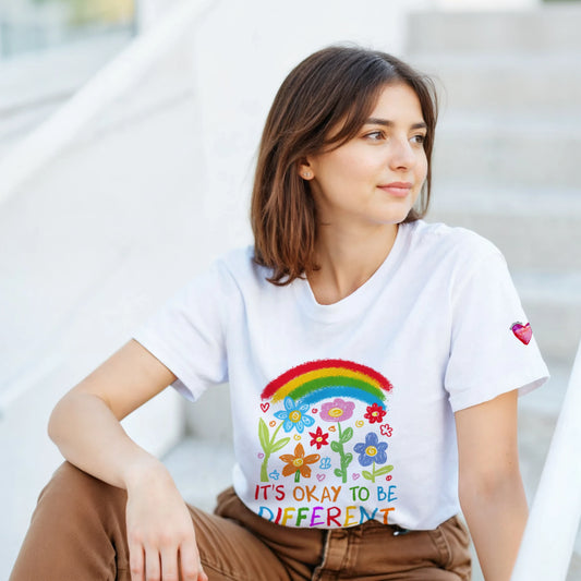 A women wearing It's okay to be different t-shirts 