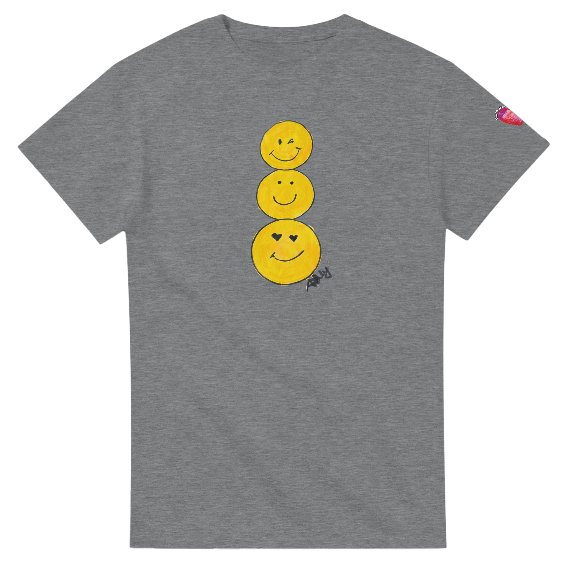 A heather gray short-sleeve T-shirt featuring a graphic of three stacked yellow smiley faces on the front, by Ashley Caldwell with a small pink heart patch on the left sleeve.